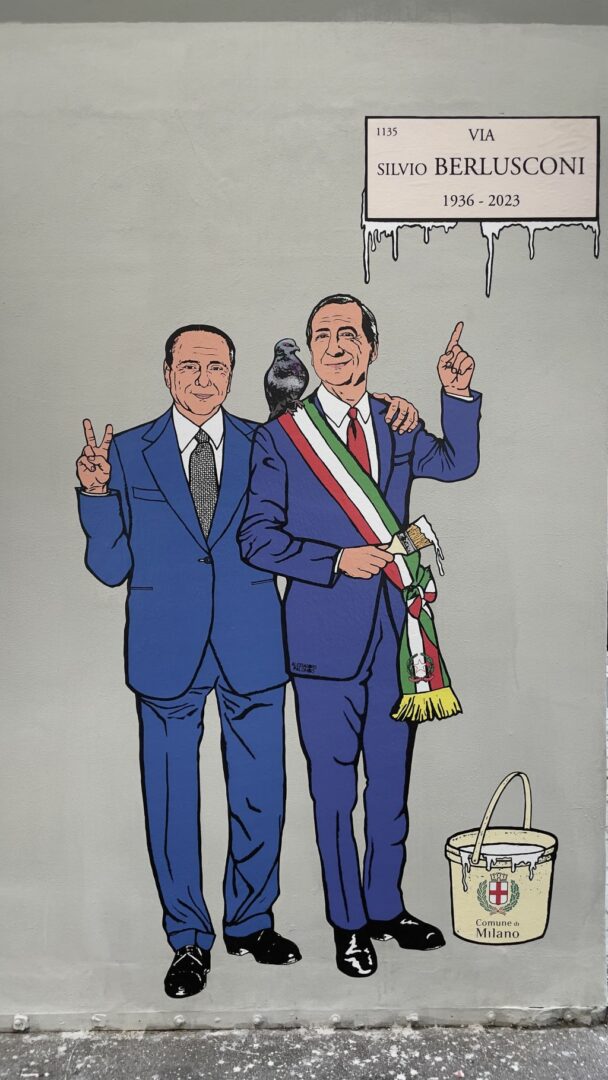 Milano, nel quartiere Isola il murales “l’unità” con Berlusconi e Sala
