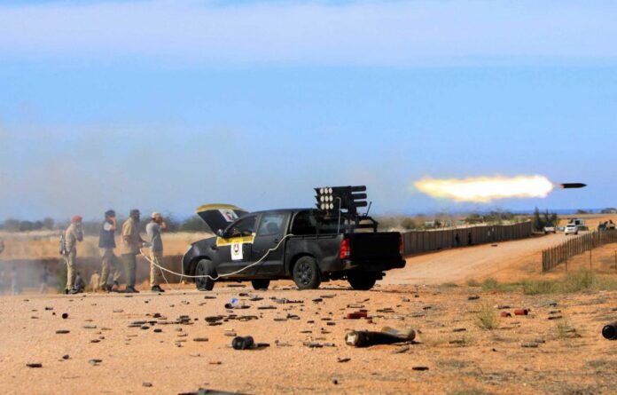 GUERRIGLIERI LIBICI CONTRO LE MILIZIE DI GHEDDAFI