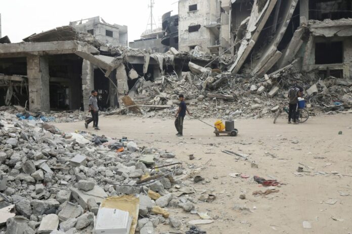Palestinians, including children, who migrated from Rafah to Deir al-Balah due to Israeli attacks, Dair El-Balah, Gaza Strip, Palestinian Territory - 28 May 2024