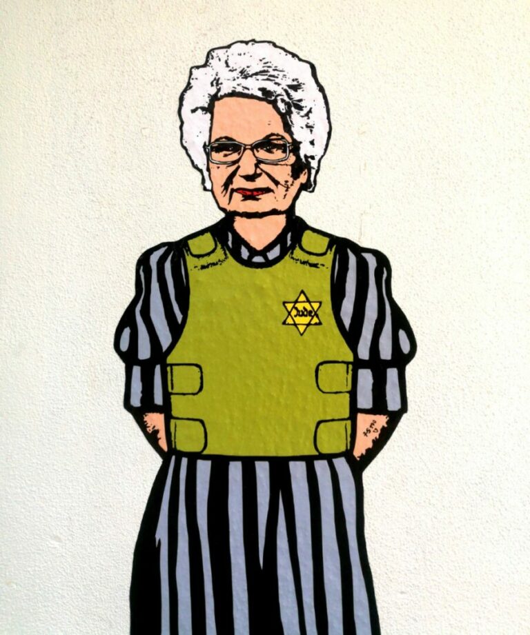 Milano, spunta un murale di Liliana Segre con giubbotto antiproiettile